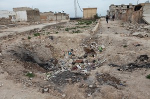 Bomb crater in Serekaneye, Syria. Photo Credit: Fatih Polat., March 22, 2013.